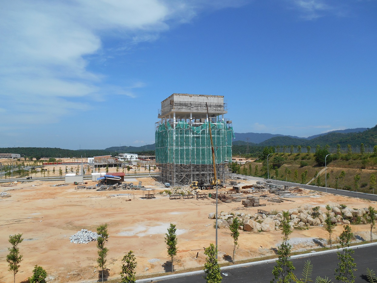 Construction of a new commercial building with initial commercial landscaping shown