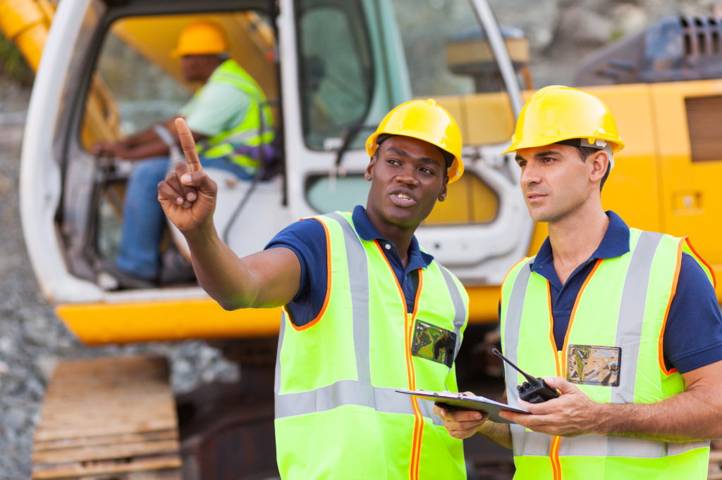 construction manager talking at construction site